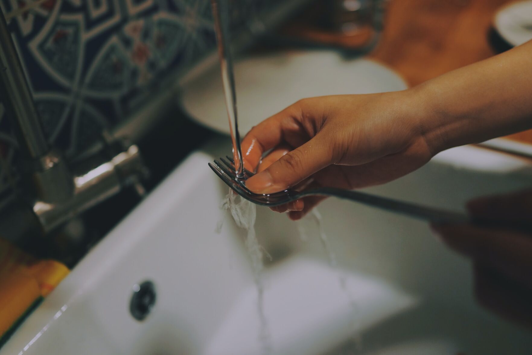2. Then: Always pre-rinse dishes before loading the dishwasher.